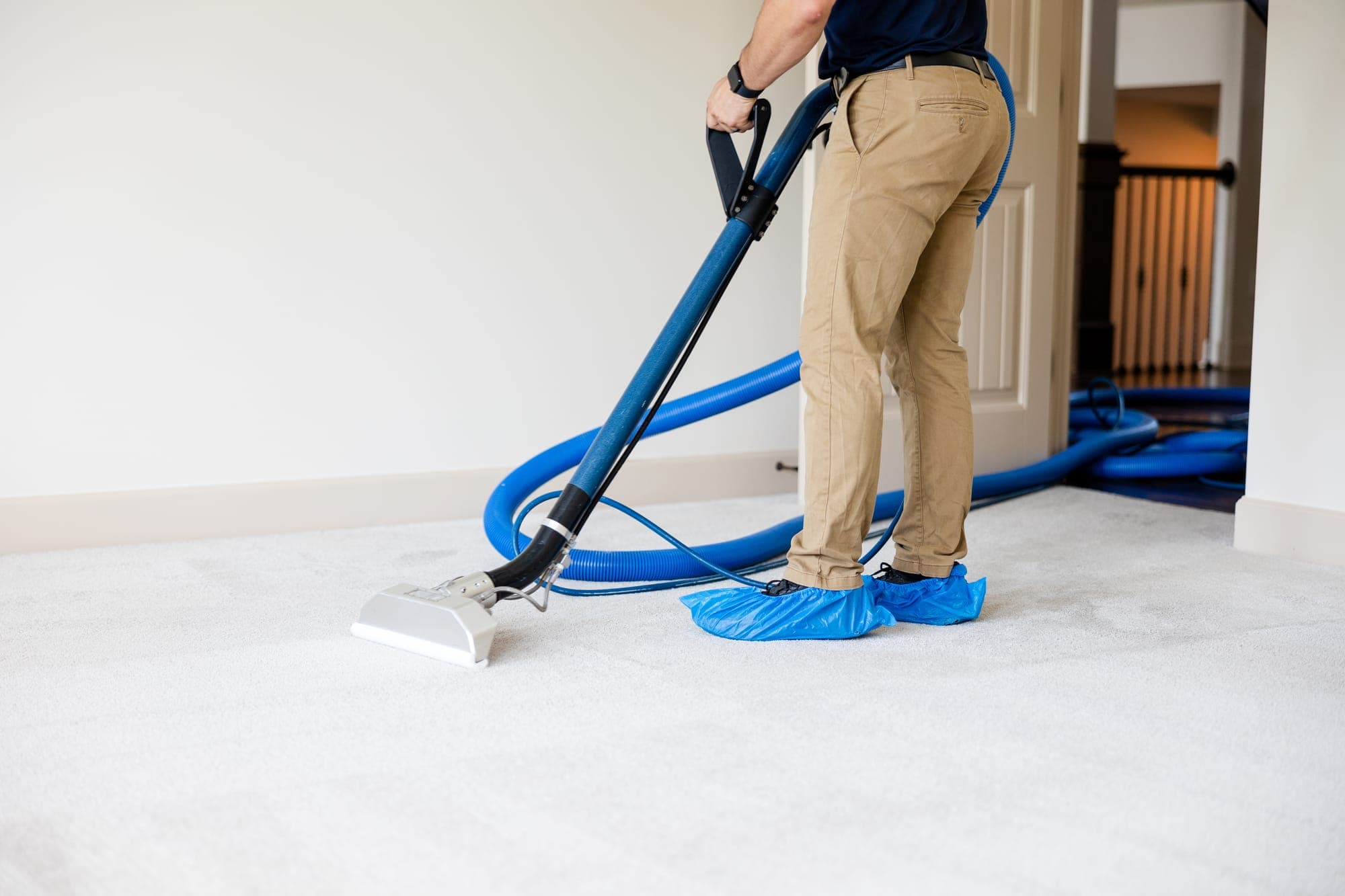 Hot water extraction in progress during a carpet cleaning visit in Spokane