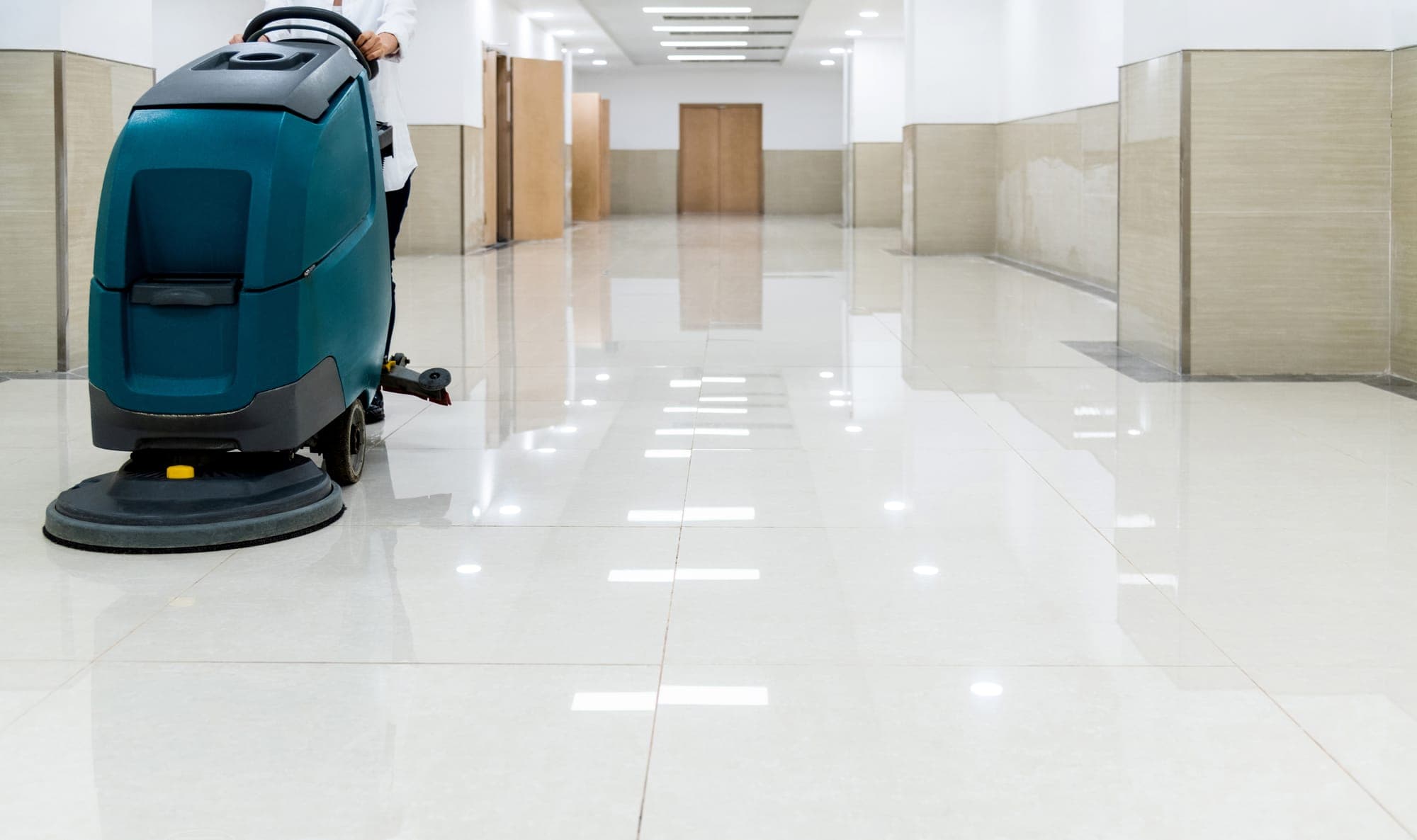 Machine scrubbing a hard floor at a Spokane Valley facility