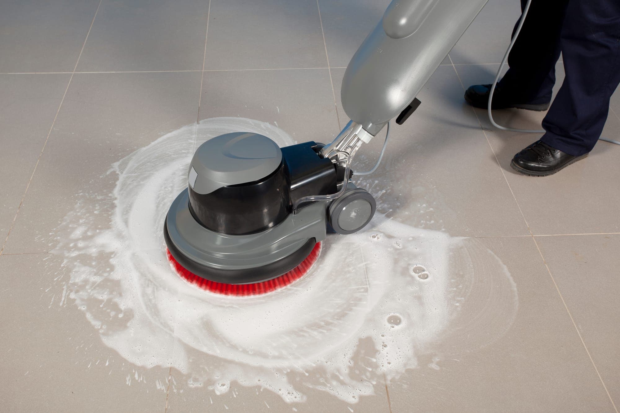 A strip and wax job underway on a tile floor in Spokane Valley